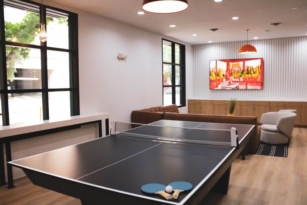 sparq-on-rio-apartments-near-ut-austin-resident-clubhouse-game-room-ping-pong